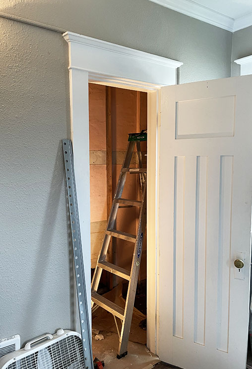 open closet door with closet under construction