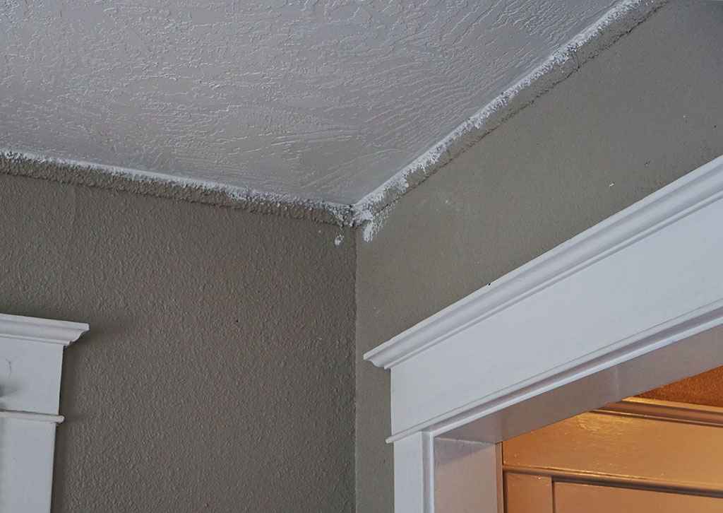 crown moulding covered in paint and texture