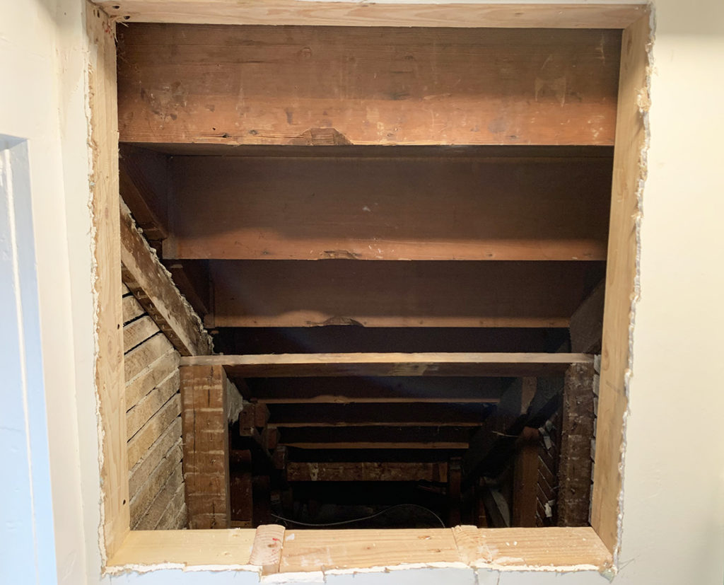 View of new framing for added bathroom storage