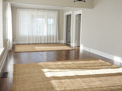 front room with rugs at angle