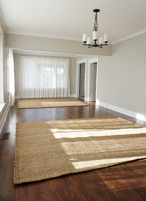 front room with rugs at angle